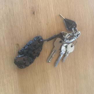 Porte-clé en bois flotté à motif piqueté